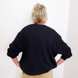 woman wearing a black sweatshirt