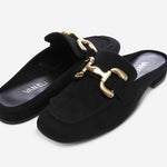 Black loafers with gold chain detail on a white background, featuring the brand 'Vaneli'.