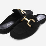 Black loafers with gold chain detail on a white background, featuring the brand 'Vaneli'.