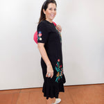 Zivana black ruffle knit midi dress with floral embroidery.